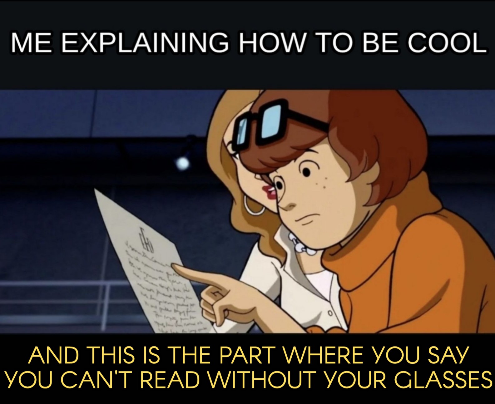 a meme that says me explaining how to be cool, and the meme shows scooby doo's Velma character being told by the director on how to properly act out the scene, Velma has her glasses raised to the top of her head as she is pointing to the exact line that the director is referencing, and the director is telling her, and this is the part where you say you can't read without your glasses.