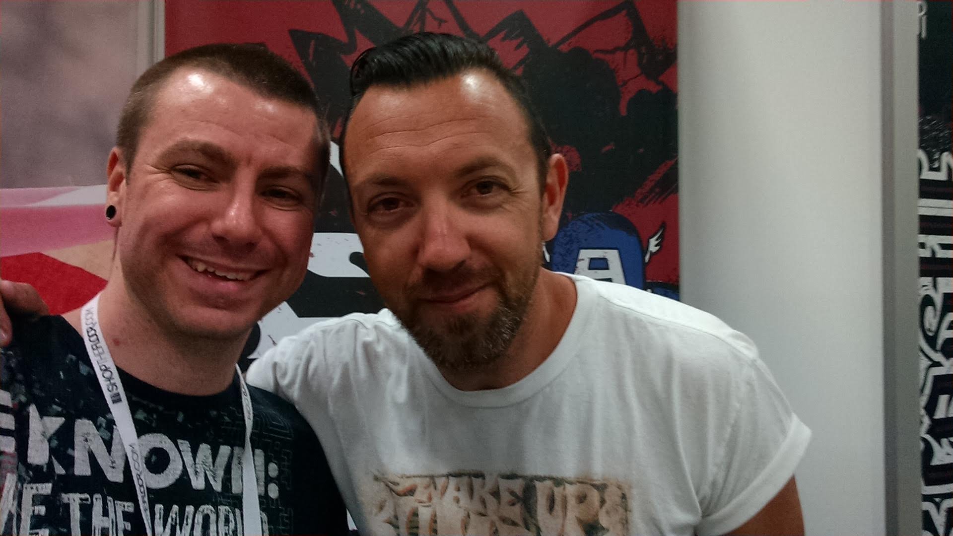 Chance Trahan (left) smiling with former Lifehouse guitarist Ben Carey (right) at a music event